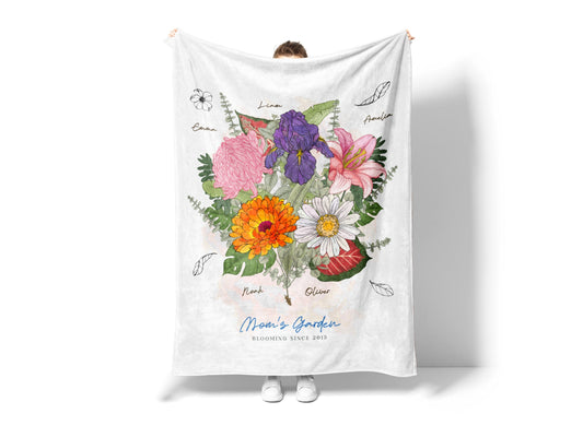 Person holding personalized floral blanket