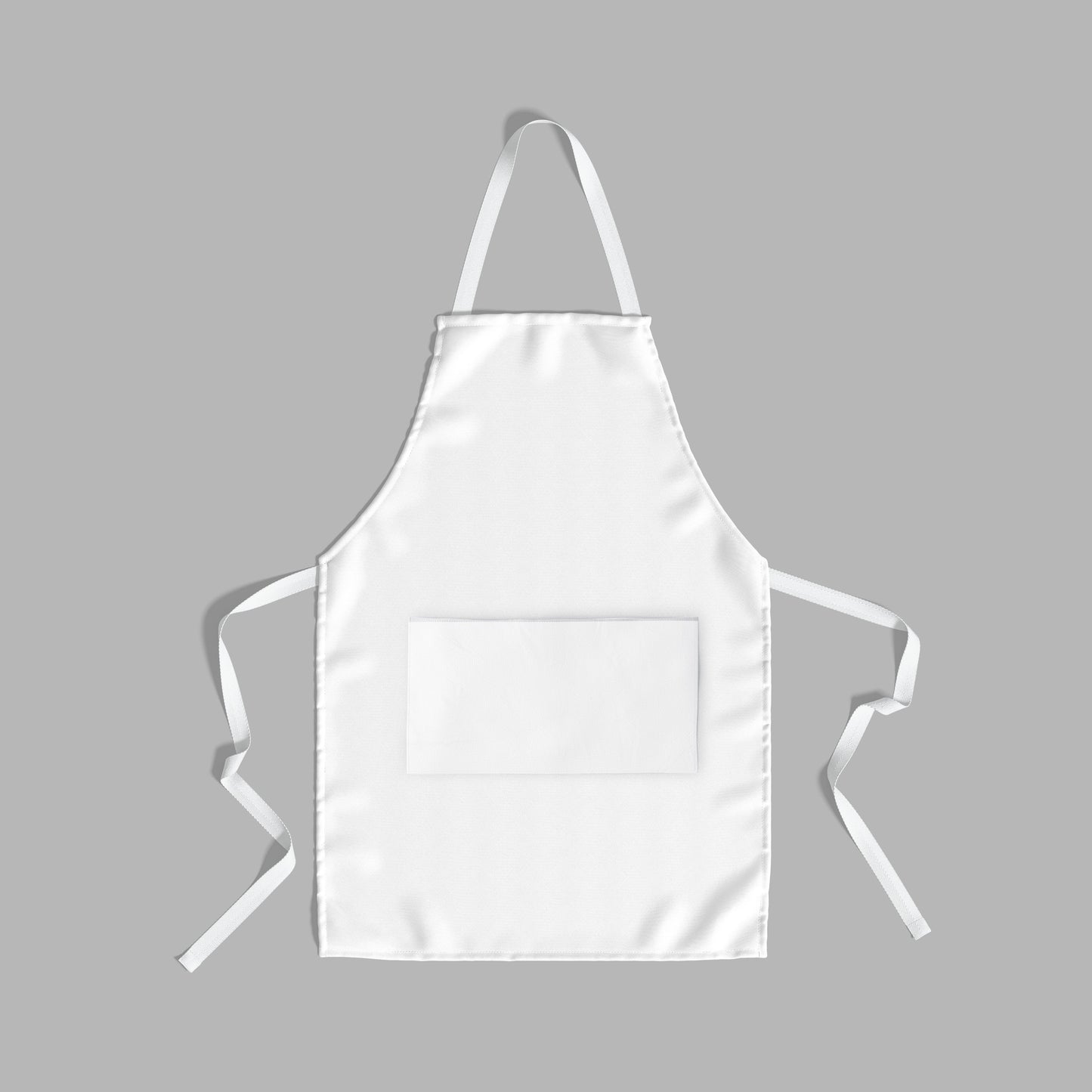 A Custom Cotton Apron displayed flat on a grey surface