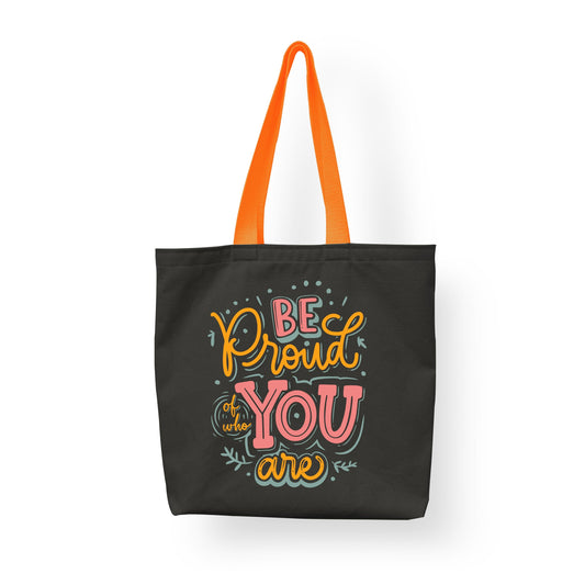 A cotton shopping tote by Sam and Zoey with the quote "Be Proud of Who You Are," designed for eco-friendly shoppers and teachers