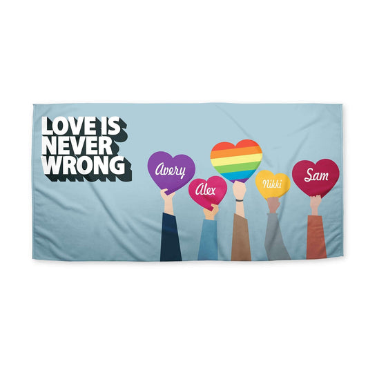 A Love is Never Wrong LGBTQ Pride Beach Towel displayed on a white surfce