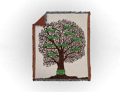 Woven throw blanket featuring an intricate family tree design with 9 names on green banners, displayed flat on a white background.