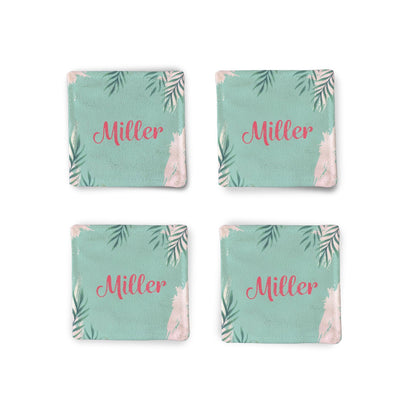 A set of 4 Personalized Green Summer Fabric Coasters on a white surface