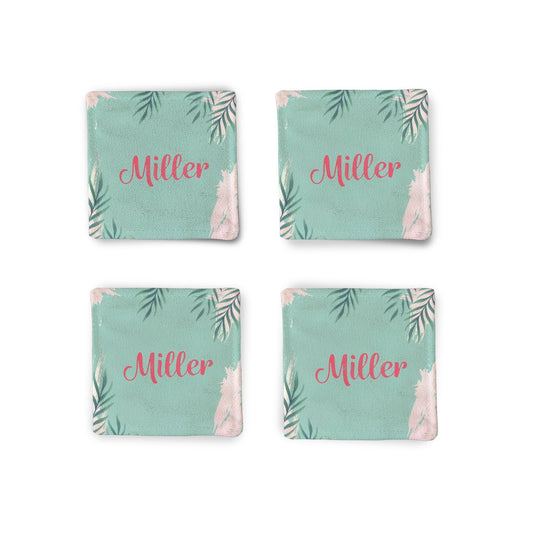 A set of 4 Personalized Green Summer Fabric Coasters on a white surface