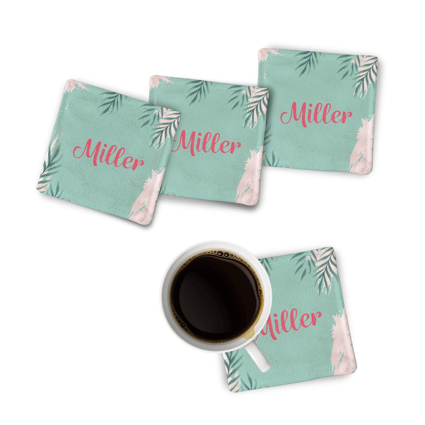 4 Green Summer Fabric Coasters along with a coffee mug on a white surface