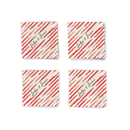 A set of 4 Personalized Strokes of Love Fabric Coasters on a white surface