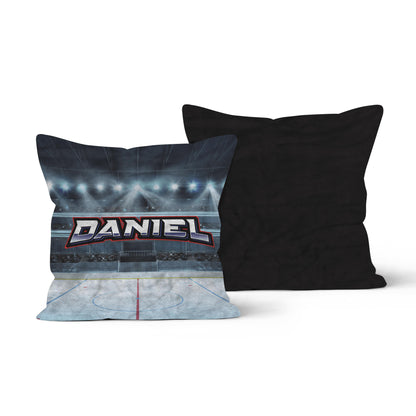 Both side of a throw pillow with a hockey rink design, featuring the name "Daniel" in bold letters