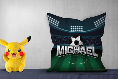 Personalized pillow with "Michael," showing a soccer field design, pikachoo soft toy on side