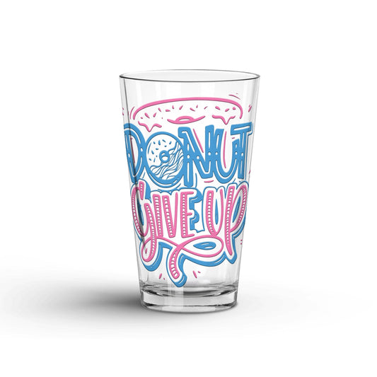 Donut Give Up transparent Tumbler Glass being shown in a white background