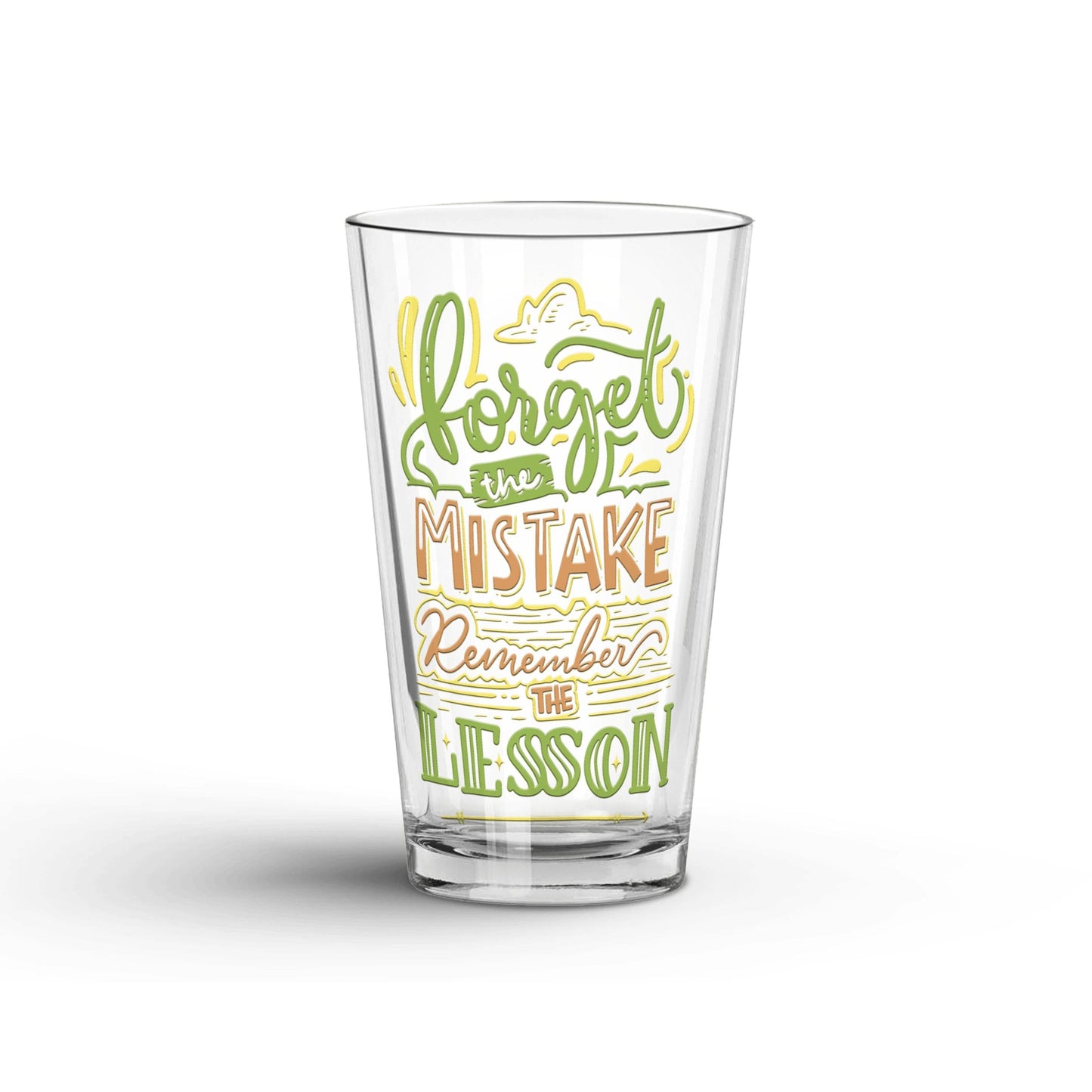 Forget The Mistake Remember The Lesson transparent Tumbler Glass being shown in a white background