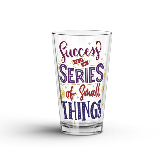 Success Is A Series Of Small Things transparent Tumbler Glass being shown in a white background