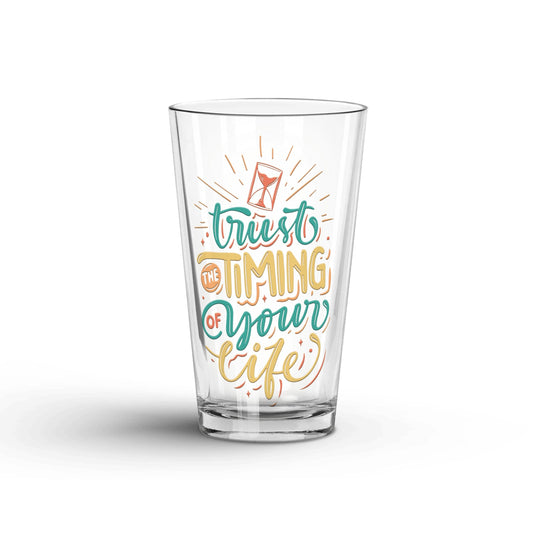 Trust The Timing Of Your Life transparent Tumbler Glass being shown in a white background