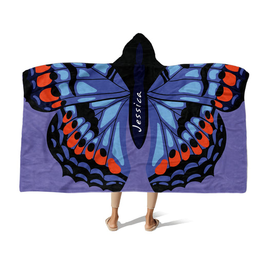 Person wearing a Hooded Fleece Blanket: Butterfly Wings design and a customized name Jessica