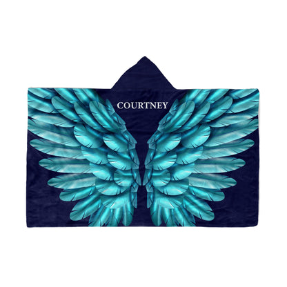 backside of a Hooded Fleece Blanket: Turquoise Wings design and a customized name Jessica