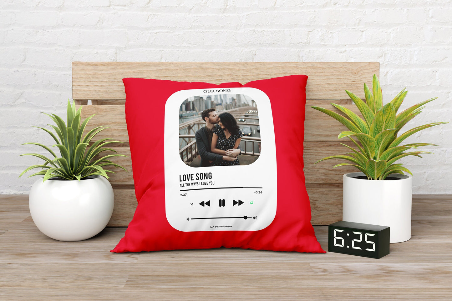 A red customized photo pillow lying on couch