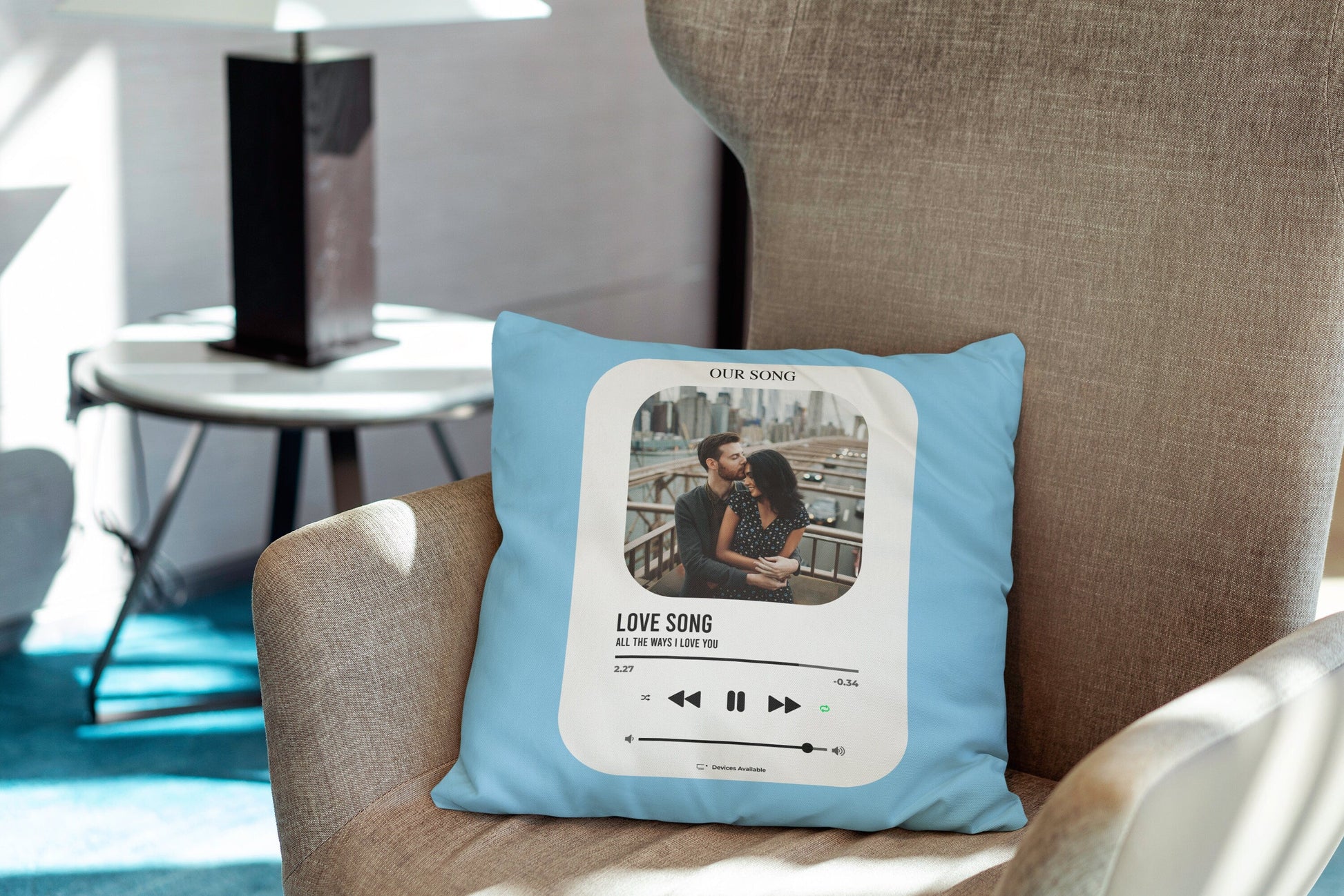 A sky color customized photo pillow lying on couch