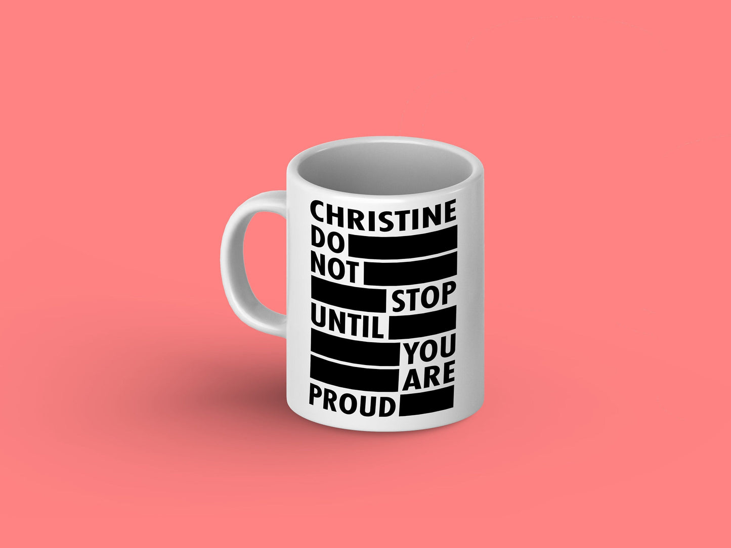 White ceramic mug with a colorful "Don't Stop until you are proud" graphic and personalized name