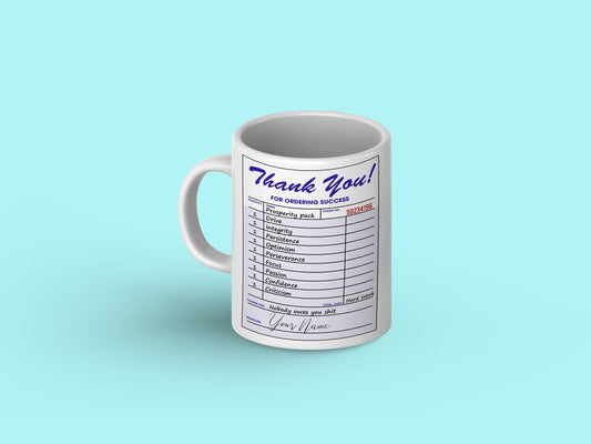 White ceramic mug with "Order Success" graphic and personalized name in colorful text