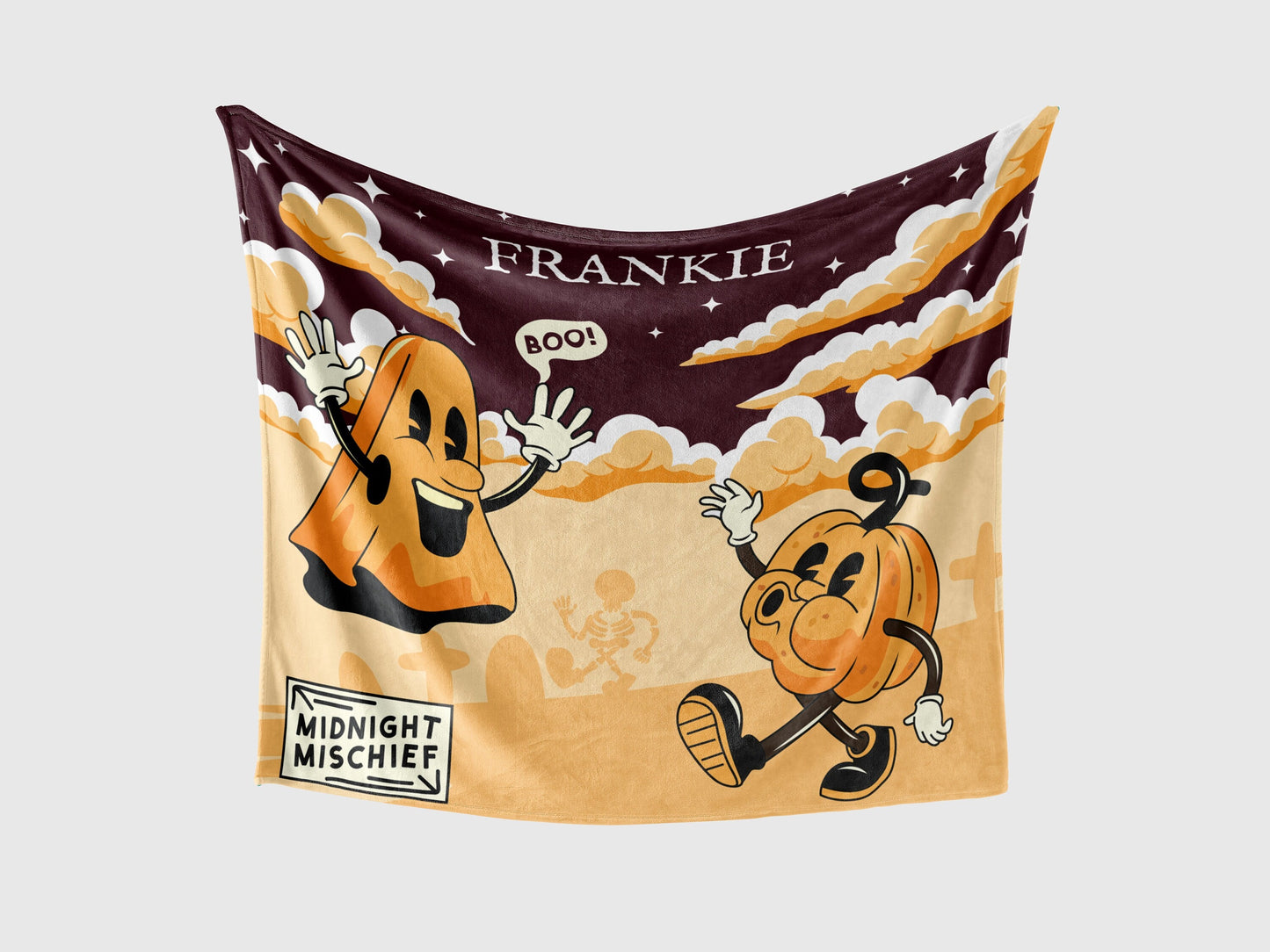 Personalized Throw Blanke with whimsical ghosts, pumpkins, cloud and sky in vibrant colors.