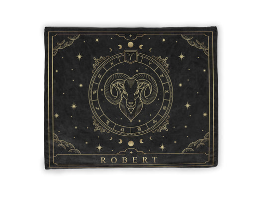 A black throw fleece blanket with Aries Zodiac sign and customized name with a white background