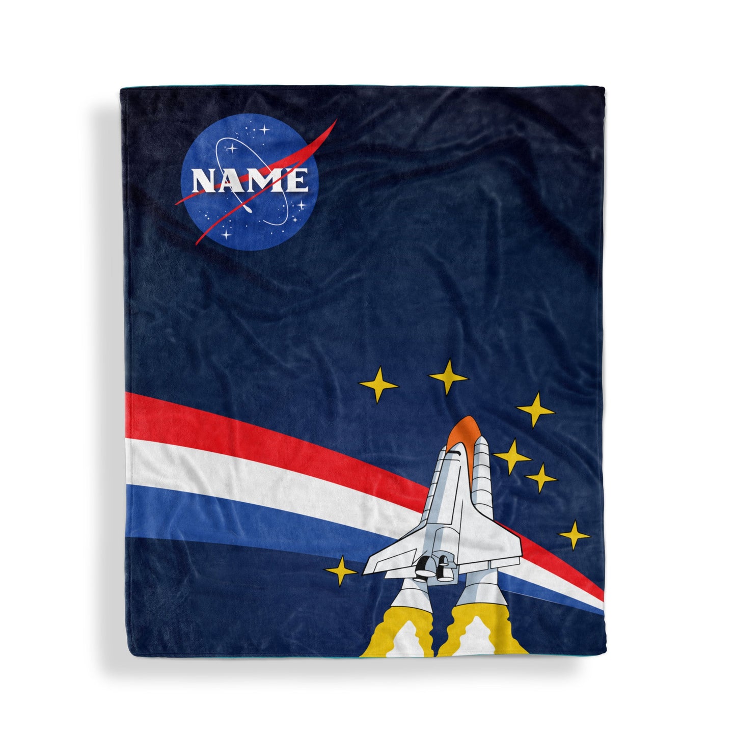 A throw blanket with NASA launch design and customized name, displayed flat on white surface