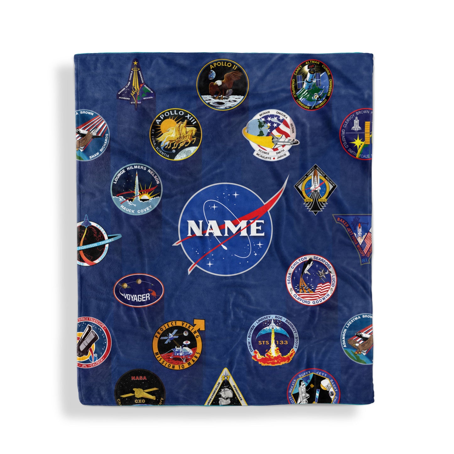 A throw blanket with Space mission patches design and customized name, displayed flat on white surface