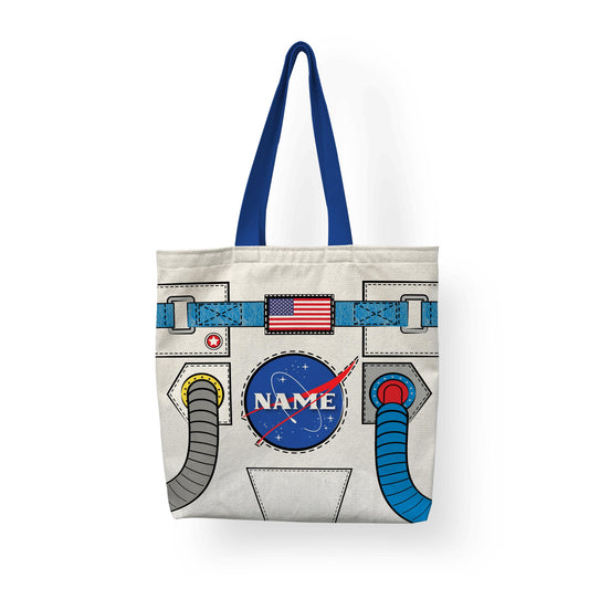 A tote bag with Astronaut suit design displayed on a white surface with blue handle